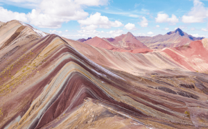 scenery at vinicunca with red valley in the background